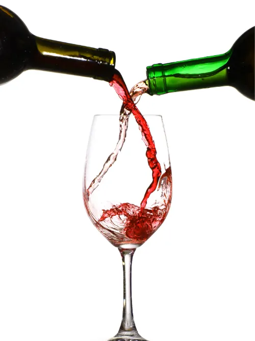 Mixing red and white wine in a glass