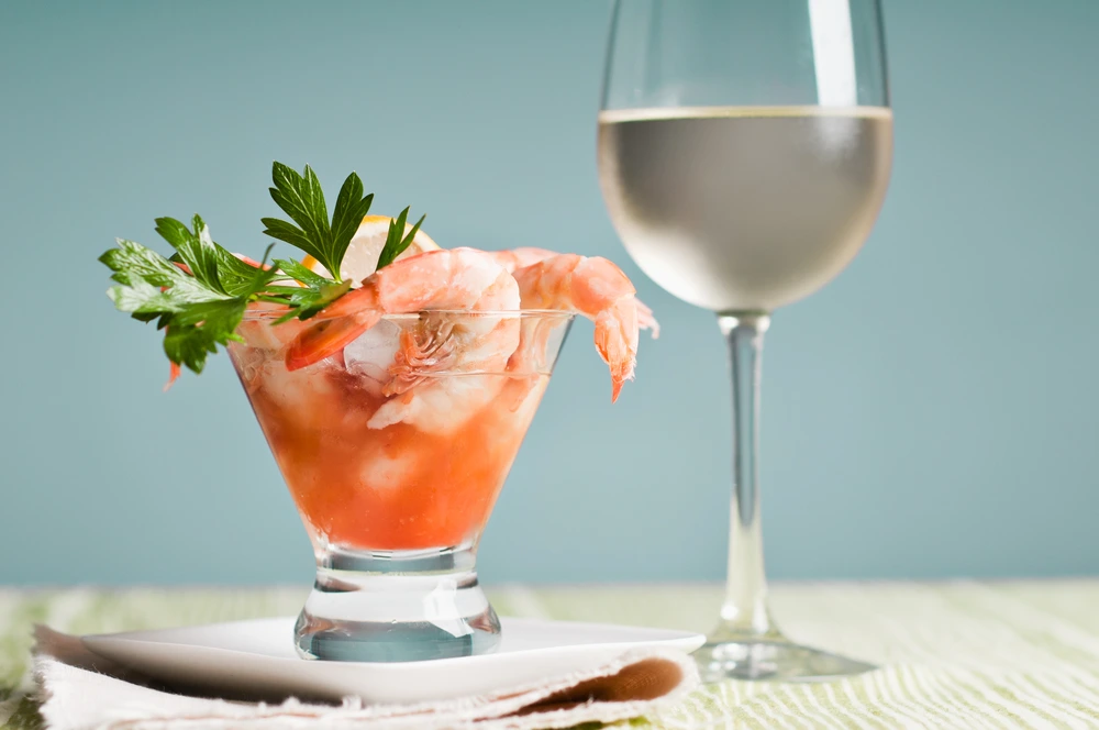 Shrimp cocktail and a glass of wine - Wine pairings for shrimp cocktail