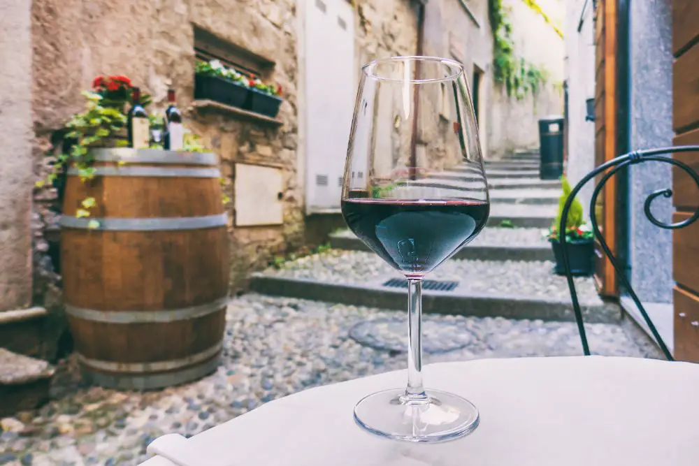 Red wine glass on Italian restaurant table