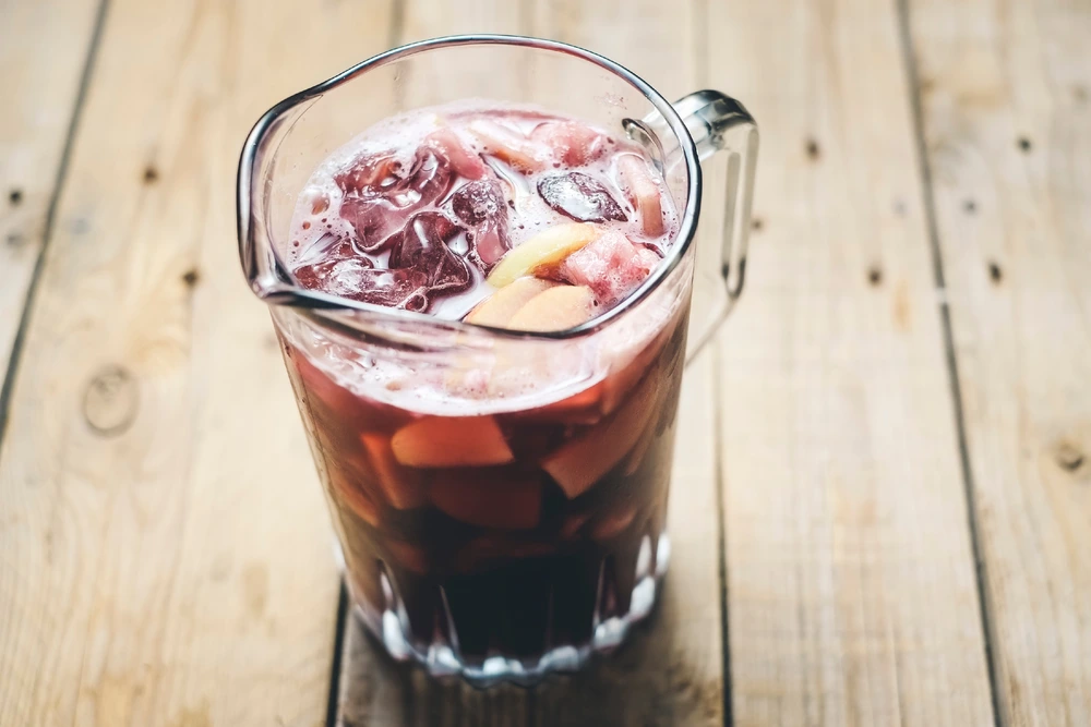 Red Wine Pitcher full of fruit and ice