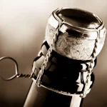 Close up of sparkling wine corkscrew in black and white