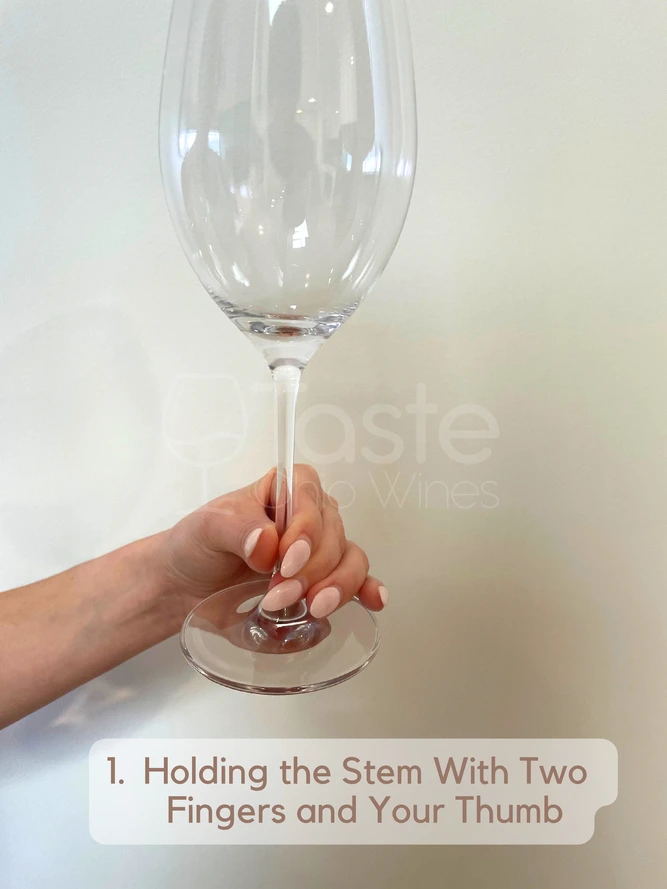 How to Hold a Wine Glass With a Stem 1. Holding the Stem With Two Fingers and Your Thumb