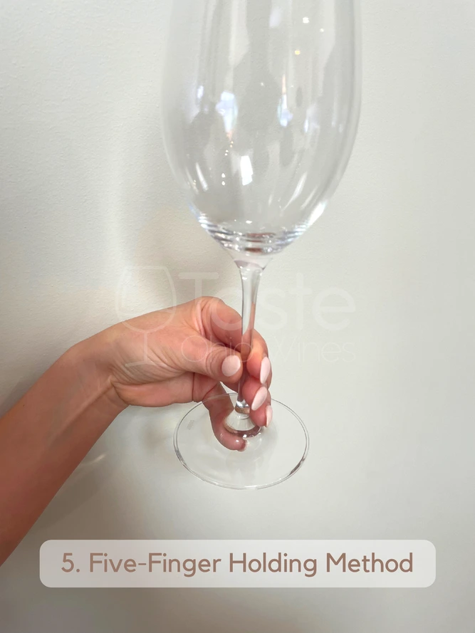 How to Hold a Wine Glass With a Stem 5. Five-Finger Holding Method
