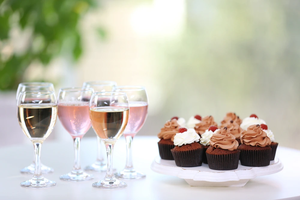 Sugar content in wine - Wine and desserts on a table